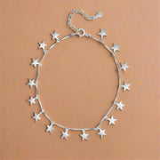 Silver star-shaped bracelet on a white background